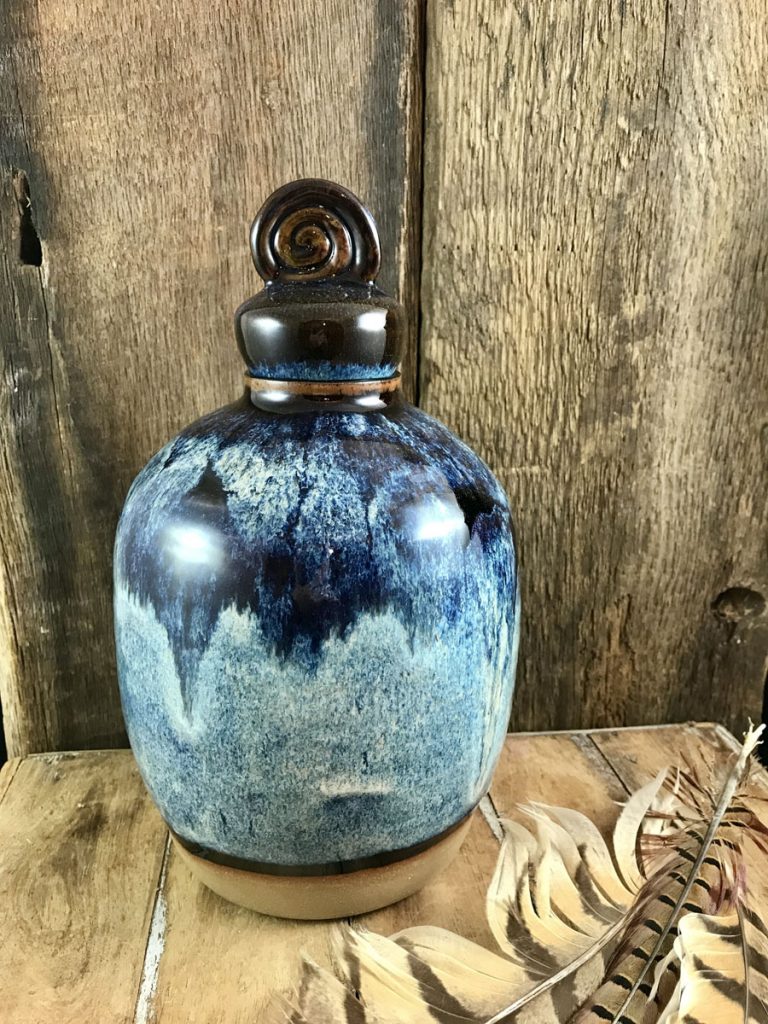 Ceramic jar with spiral lid in cosmic blue
